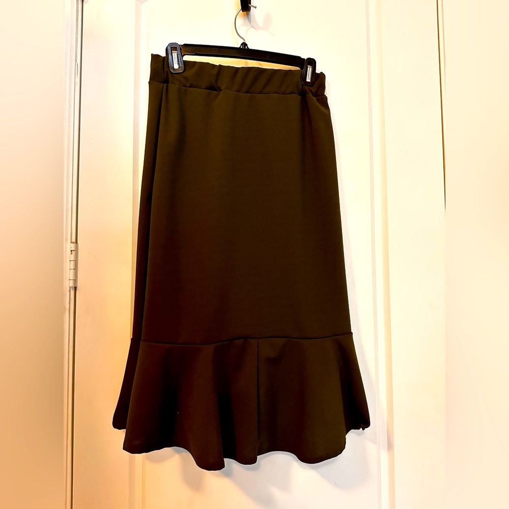 Olive medium green long skirt with gold buttons. This light material.